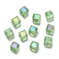 Macro view of 6mm light green faceted crystal cube beads with iridescent AB coating - 10pcs/Pack / Green
