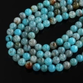 Macro shot of blue-green dragon vein agate beads with unique natural crackle texture - Aquamarine Dragon Vein Agate