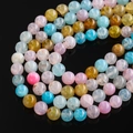 Macro shot of colorful dragon vein agate crackle round beads for DIY jewelry making - Morgan Agate