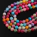 Macro shot of colorful dragon vein agate beads with crackle texture for jewelry DIY - Colorful Dragon Vein Agate