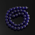 Macro detail of dark blue frosted moldavite glass beads with crater texture for DIY jewelry - 6mm (Approx. 72 Beads/Strand) / Lapis Blue