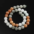 Macro-detail van veelkleurige drakenader agaat ronde kralen voor DIY sieraden maken - 6,5 mm (ca. 57 kralen/streng) / Gradiënt Driekleurige Hetian Jade