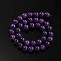 Macro-opname van gepolijste paarse drakenagaat kralen voor DIY-sieraden maken - 6,5 mm (ca. 57 kralen/streng) / Amethist