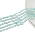 Dettaglio macro di perline sfaccettate in amazzonite blu chiaro da 3mm per creare gioielli - Amazonite