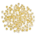 Close-up of golden metal butterfly backs and transparent silicone earring stoppers - 20 Pieces/Pack (4.5x5mm) / Gold