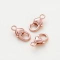 Tre chiusure a moschettone a forma di cuore placcate oro rosa 18 carati per gioielli fai da te - Moschettone Cuore / 5 Pezzi/Confezione (14*26.8mm) / Oro Rosa Lucido