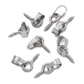 Gros plan sur sept attaches de pendentif en acier inoxydable poli pour bijoux DIY - Bélière 3*7mm/Piton 5*10mm / Acier