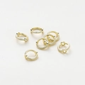 Vista macro de conectores de anillo de oro 14K con textura de cuerda para joyería artesanal - 1.3x3x9mm / Oro 14K