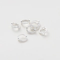 Vista detallada de anillos de cuentas festoneados de oro 14K para accesorios de joyería - 1.3x3x9mm / Tono Plateado Baño Oro