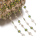 Macro shot of gold daisy chain with green enamel petals and sparkling crystal accents - Daisy Chain KC Dark Green (7.5x12.5mm)