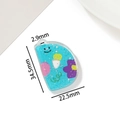 Detailed view of sky blue acrylic letter D pendant with glitter and cute floral print - Letter D