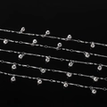 Détail d'une chaîne plaquée argent avec clochettes pour création de bijoux DIY - 1m / Ton Argent - Style Cloche