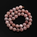 Streng roze drakenaderagaat kralen met natuurlijke textuur en glanzende afwerking - 6,5 mm (ca. 57 kralen/streng) / Zonnesteen