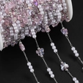 Detail of DIY butterfly bead chain with faux pearls and pink butterflies on white spool - 1m / Silver Pink