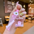 Gros plan du porte-clés Capybara liquide rose avec sangle en silicone Sweet Heart - Style de Sangle [Rose Allongé] Capybara Grand Cube