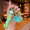 Luminous helicopter keychain with glitter liquid quicksand and sweet heart wrist strap - Green