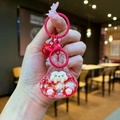 Detail of red liquid quicksand keychain with glitter and cute cartoon rabbit charm - Colorful Hardware Keychain Style / Luminous Burst Flashing Tata (Red)