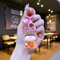 Rosa Kaninchen Schlüsselanhänger mit bunten Zuckerstücken und kleinem Glöckchen - Bunte Hardware Regenbogen Nachleuchtende Lilith