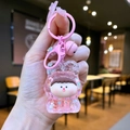 Detail eines rosa Bär-Schlüsselanhängers aus Harz mit Glitzer und kleiner Glocke - Bunte Hardware Rosa Nachleuchtende Lilith