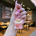 Dettaglio portachiavi rosa a fumetti con sabbie mobili liquide, paillettes e campanellino - Stile Chiusura a Moschettone / Rosa Luce Notturna Glitter Ragazza di Frutta