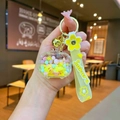 Macro shot of Sakura themed keychain featuring colorful beads, yellow strap and pink butterfly - Quicksand TV / Sakura Strap (Yellow)