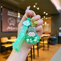 Detail of mint green acrylic bunny keychain with liquid sequins and Sweet Heart strap - Leather Strap Keychain Style / Luminous Burst Flashing Tata (Green)