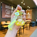 Detail of yellow acrylic bunny keychain with liquid glitter, gold bell and wrist strap - Leather Strap Keychain Style / Luminous Burst Flashing Tata (Yellow)