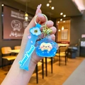 Close-up of blue silicone strap and golden bell detail on cartoon animal keychain - Blue (With Strap)