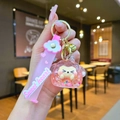 Detailed view of a pink glitter liquid keychain featuring a cute pig and Sweet heart strap - Pink (With Strap)