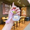 Close-up of pink cartoon liquid keychain with glitter and sweet heart hand strap - White (With Strap)