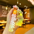 Portachiavi creativo con sabbia mobile gialla, ciondoli mahjong e cinturino bubble - Stile Sabbie Mobili Barile d'Acqua con Bolle Luminose / Giallo