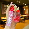Simpatico portachiavi unicorno rosa a forma di dispenser con glitter e cinturino - Stile Sabbie Mobili Barile d'Acqua con Bolle Luminose / Rosso
