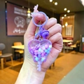 Handheld purple heart-shaped liquid quicksand keychain with bell and wand pendant charm - Purple Snowflake Heart Key / Color Hardware-Purple