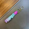 Gradient glitter keychain with purple to teal silicone strap and Bubble lettering - Purple