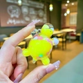 Detail of yellow turtle acrylic charm with colorful flowing beads held in hand - Small Milk Bean Turtle / 1 Piece / Yellow