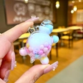 Detailed view of a mini acrylic turtle charm with colorful moving beads inside - Small Milk Bean Turtle / 1 Piece / White