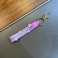 Purple floral silicone keychain strap with Happy Moments text and golden metal ring - Purple
