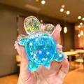 Handheld liquid turtle variant with blue glitter and cherry blossom sequins inside - 1 Piece / Large [Blue] Luminous Sparkle Turtle