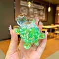 Green turtle figurine with sparkling sequins and colorful floral glitters - Large Luminous Glitter Turtle / 1 Piece / Green