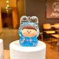 Blue glitter liquid sand keychain featuring a cute cartoon character in resin shell - Without Buckle Style / Blue