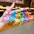 Lot de porte-clés sucettes en acrylique lumineux de couleurs vives avec petites cloches - Style Fermoir Mousqueton / Sucette à flocon de neige multicolore (Mélange aléatoire)