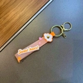 Pink silicone Sweet Heart keychain strap with white flower and gold keyring - 1 Piece / Orange