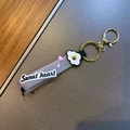 Grey silicone keychain with sweet heart lettering and white flower charm detail - 1 Piece / Black