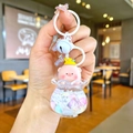 Luminous floating pig keychain with liquid sand and crown detail in a bottle - Colored Hardware Style / White