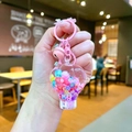 Dettaglio portachiavi a mongolfiera rosa con perline, paillettes e campanellino rosa - Stile Chiusura a Moschettone / Hardware Multicolore (Colorato) Mongolfiera Luminosa