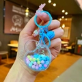 Porte-clés en cœur avec perles macaron et paillettes de flocon de neige bleues - Style Fermoir Mousqueton / Métal Coloré (Bleu)