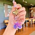 Starfish flower drifting bottle keychain with purple glitter and golden bell - Pendant Only (Without Chain) / Purple Flower With Golden Hardware