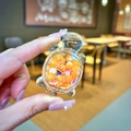Detailed close-up of a creative transparent turtle pendant with orange moving beads - Orange Luminous Bubble Bead Turtle