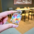 Primer plano de tortuga de resina transparente con bolas de purpurina de colores - Tortuga de Cuenta de Burbuja Luminosa Colorida