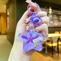 Star-shaped purple liquid glitter acrylic keychain with seashell and starfish charms - Purple Star With Matching Hardware